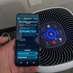 Smart HEPA air purifier with digital display and Wi-Fi connectivity for large rooms, controlled via smartphone app.