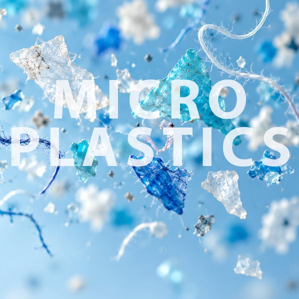 Close-up of microplastics particles in the air, highlighting environmental pollution concerns.