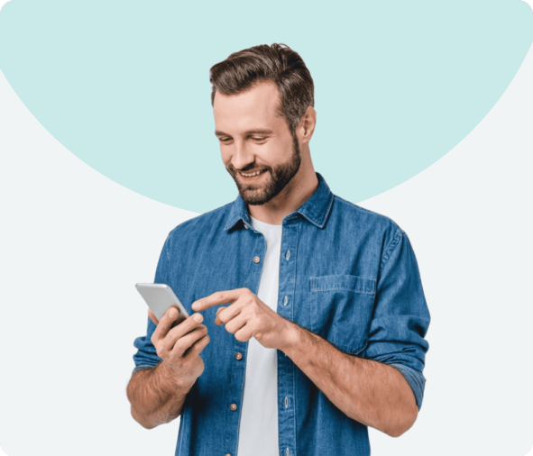 Smiling man using smartphone, representing trusted air conditioning and HVAC services.